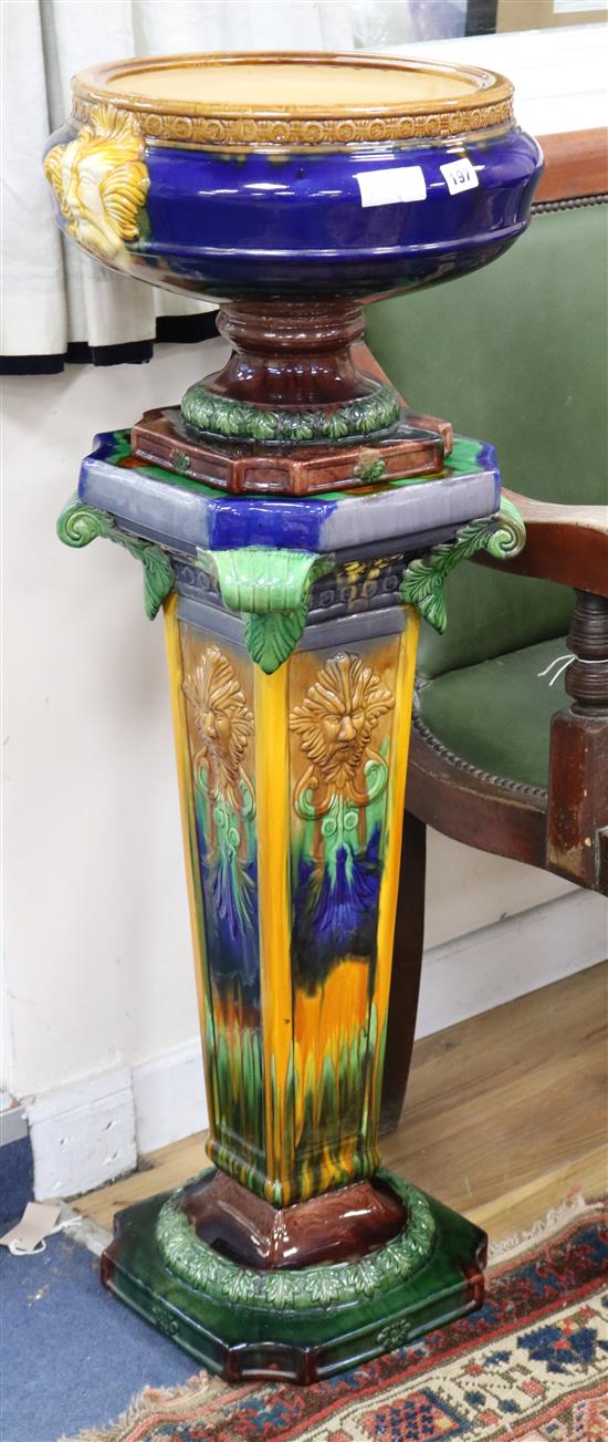 A Majolica style jardiniere on stand overall height 108cm